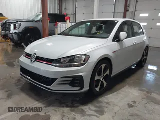 2018 Volkswagen Golf GTI S with VIN 3VW447AU7JM293939, listed as a IAAI auction lot 41318359 with 59,531 mi miles. Bid and sale history available at carsss.com. Image 2.