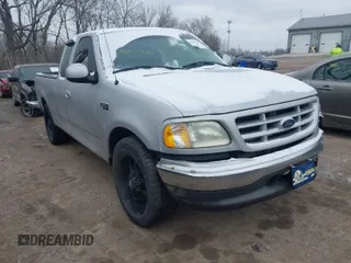 2002 Ford F-150 XL with VIN 1FTRX17212NA45843, listed as a IAAI auction lot 41575856 with 136,570 mi miles. Bid and sale history available at carsss.com. Image 1.