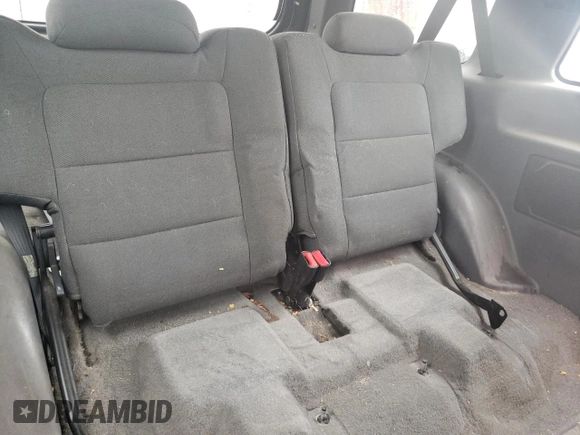 2001 Ford Explorer Sport z VIN 1FMYU60E11UC18170, wystawiony jako Copart lot #49212385 z przebiegiem 219 383 mil mil oraz Tytuł czysty. Historia ofert i sprzedaży dostępna na DreamBid. Obrazek 10.
