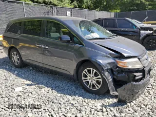 2012 Honda Odyssey EX-L with VIN 5FNRL5H69CB019771, listed as a Copart auction lot 59333624 with 197,203 mi miles and Salvage Title. Bid and sale history available at carsss.com. Image 4.
