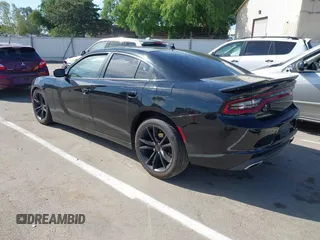 2016 Dodge Charger SXT with VIN 2C3CDXHG6GH146764, listed as a IAAI auction lot 42020618 with 154,693 mi miles and . Bid and sale history available at carsss.com. Image 3.