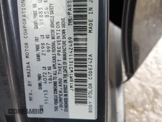 2014 Mazda 3 S Grand Touring z VIN JM1BM1W31E1142489, wystawiony jako Copart lot #43557485 z przebiegiem 158 399 mil mil oraz Szkoda całkowita • Salvage title. Historia ofert i sprzedaży dostępna na DreamBid. Obrazek 12.