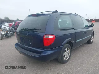 2005 Dodge Caravan SE with VIN 1D4GP24R95B420644, listed as a IAAI auction lot 42302868 with 256,701 mi miles and . Bid and sale history available at DreamBid. Image 4.