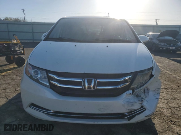 2014 Honda Odyssey EX-L with VIN 5FNRL5H61EB005740, listed as a Copart auction lot 54663595 with 118,971 mi miles and Salvage Title. Bid and sale history available at DreamBid. Image 5.