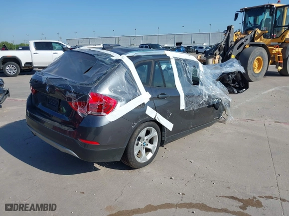 2014 BMW X1 sDrive28i with VIN WBAVM1C53EVW48026, listed as a IAAI auction lot 41714732 with 1 mi miles. Bid and sale history available at carsss.com. Image 4.