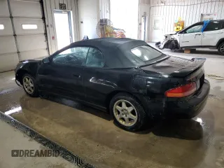 1997 Toyota Celica GT z VIN JT5FG02T3V0041206, wystawiony jako Copart lot #54601725 z przebiegiem 198 685 mil mil oraz Szkody całkowita. Historia ofert i sprzedaży dostępna na DreamBid. Obrazek 2.