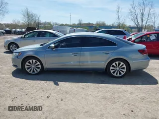 2013 Volkswagen CC Sport with VIN WVWBN7AN6DE536425, listed as a IAAI auction lot 42091513 with 180,753 mi miles. Bid and sale history available at carsss.com. Image 14.