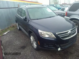 2011 Volkswagen Tiguan SEL w/Premium Navi with VIN WVGAV7AX0BW511228, listed as a IAAI auction lot 36326742 with Not provided miles and . Bid and sale history available at DreamBid. Image 1.