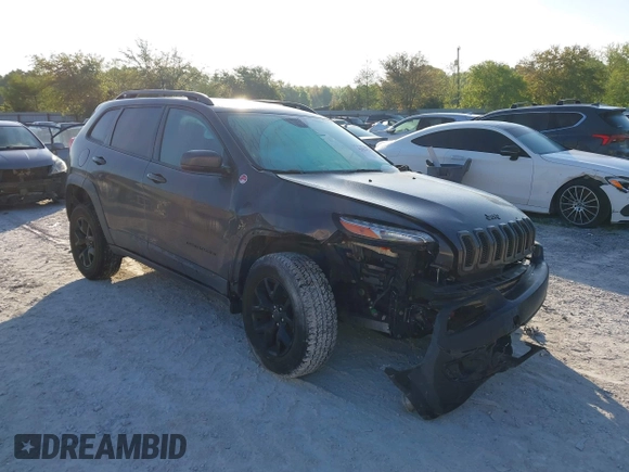 2018 Jeep Cherokee Trailhawk with VIN 1C4PJMBX7JD517299, listed as a IAAI auction lot 42022770 with 62,865 mi miles. Bid and sale history available at carsss.com. Image 1.