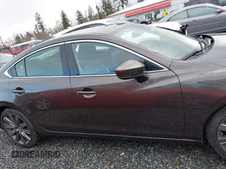 2018 Mazda 6 Grand Touring with VIN JM1GL1TYXJ1301545, listed as a IAAI auction lot 41131114 with 34,089 mi miles and . Bid and sale history available at DreamBid. Image 13.