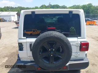 2021 Jeep Wrangler Unlimited Sahara with VIN 1C4HJXEN1MW618508, listed as a IAAI auction lot 42639515 with 39,747 mi miles and . Bid and sale history available at DreamBid. Image 16.