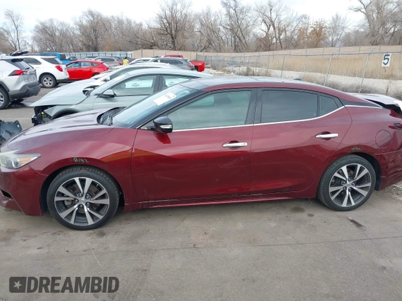 2016 Nissan Maxima SV with VIN 1N4AA6AP9GC410441, listed as a IAAI auction lot 41479069 with 74,252 mi miles and . Bid and sale history available at DreamBid. Image 14.