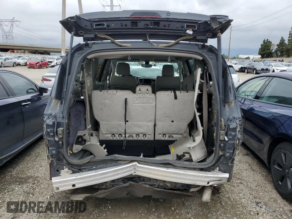 2021 Chrysler Voyager LXi with VIN 2C4RC1DG0MR551892, listed as a Copart auction lot 55516755 with 151,137 mi miles and Clean Title. Bid and sale history available at DreamBid. Image 6.