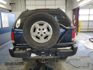 2000 Chevrolet Blazer LS z VIN 1GNCT18WXYK132399, wystawiony jako Copart lot #87880555 z przebiegiem 89 350 mil mil oraz Czysty tytuł • Clean title. Historia ofert i sprzedaży dostępna na DreamBid. Obrazek 6.