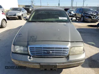 2002 Ford Crown Victoria Standard с VIN 2FAFP73WX2X103936, выставлен на аукционе Copart как лот 67688374 с пробегом 161 511 миль миль и Списание • Salvage title. История ставок и продаж доступна на DreamBid. Изображение 5.