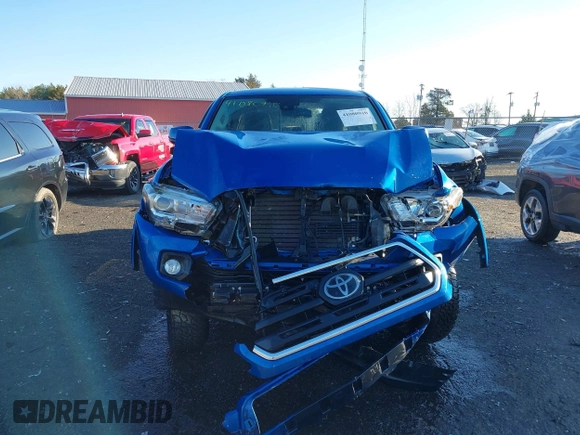 2018 Toyota Tacoma SR with VIN 3TMCZ5AN3JM138480, listed as a IAAI auction lot 41080910 with 99,225 mi miles. Bid and sale history available at carsss.com. Image 12.
