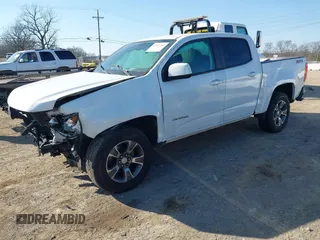 2019 Chevrolet Colorado 4WD Z71 z VIN 1GCGTDEN9K1135489, wystawiony jako IAAI lot #41752283 z przebiegiem 180 854 mil mil oraz . Historia ofert i sprzedaży dostępna na DreamBid. Obrazek 17.