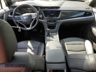 2023 Cadillac XT6 FWD Premium Luxury with VIN 1GYKPCRS4PZ103061, listed as a Copart auction lot 49300205 with 72,131 mi miles and Salvage title. Bid and sale history available at DreamBid. Image 8.