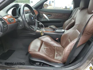 2006 BMW Z4 M z VIN 5UMBT93566LY52187, wystawiony jako Copart lot #54990615 z przebiegiem 88 810 mil mil oraz Szkody całkowita. Historia ofert i sprzedaży dostępna na DreamBid. Obrazek 7.