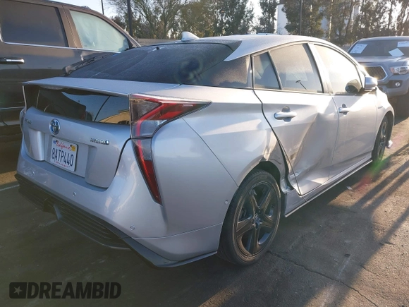 2017 Toyota Prius Two with VIN JTDKARFU3H3049806, listed as a IAAI auction lot 41811825 with 94,453 mi miles. Bid and sale history available at carsss.com. Image 4.