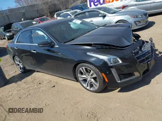 2014 Cadillac CTS Vsport Premium RWD z VIN 1G6AV5S81E0159352, wystawiony jako IAAI lot #41889600 z przebiegiem 94 859 mil mil oraz . Historia ofert i sprzedaży dostępna na DreamBid. Obrazek 1.