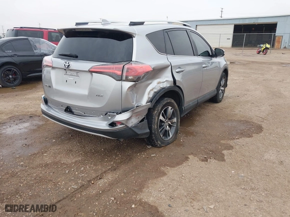 2016 Toyota RAV4 XLE with VIN 2T3WFREV4GW270548, listed as a IAAI auction lot 41699126 with 100,905 mi miles. Bid and sale history available at carsss.com. Image 4.