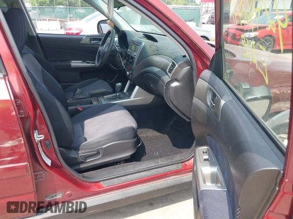 2009 Subaru Forester X with VIN JF2SH63689H721560, listed as a IAAI auction lot 42442441 with 119,896 mi miles and . Bid and sale history available at DreamBid. Image 5.