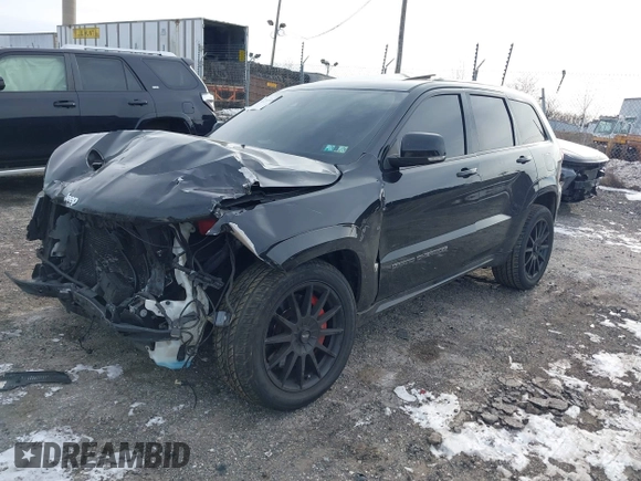 2017 Jeep Grand Cherokee SRT with VIN 1C4RJFDJ7HC641926, listed as a IAAI auction lot 41272215 with 117,667 mi miles. Bid and sale history available at carsss.com. Image 2.