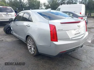 2018 Cadillac ATS Luxury RWD z VIN 1G6AB5RX6J0110860, wystawiony jako IAAI lot #41556662 z przebiegiem 63 886 mil mil oraz . Historia ofert i sprzedaży dostępna na DreamBid. Obrazek 3.
