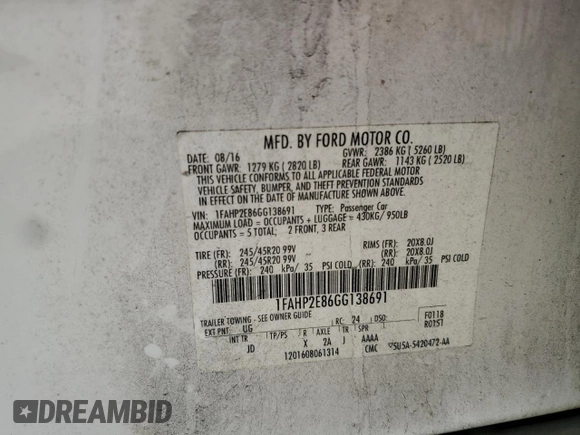 2016 Ford Taurus SEL z VIN 1FAHP2E86GG138691, wystawiony jako Copart lot #57495575 z przebiegiem Nie podano mil oraz Szkoda całkowita • Salvage title. Historia ofert i sprzedaży dostępna na DreamBid. Obrazek 13.