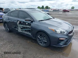 2021 Kia Forte GT-Line z VIN 3KPF34AD9ME293470, wystawiony jako IAAI lot #42335104 z przebiegiem 75 132 mil mil oraz . Historia ofert i sprzedaży dostępna na DreamBid. Obrazek 1.