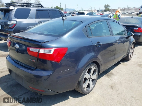 2013 Kia Rio EX with VIN KNADN4A34D6285224, listed as a IAAI auction lot 42790230 with 108,071 mi miles and . Bid and sale history available at DreamBid. Image 4.