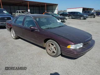 1996 Chevrolet Caprice Classic 1SA Special Value Pkg with VIN 1G1BL52P9TR184810, listed as a IAAI auction lot 41831242 with 1 mi miles. Bid and sale history available at carsss.com. Image 1.