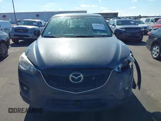 2014 Mazda CX-5 Grand Touring with VIN JM3KE4DY1E0364685, listed as a IAAI auction lot 41665349 with 135,751 mi miles. Bid and sale history available at carsss.com. Image 12.