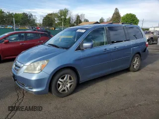 2007 Honda Odyssey EX-L z VIN 5FNRL38657B070842, wystawiony jako Copart lot #57528015 z przebiegiem 149 173 mil mil oraz Szkoda całkowita • Salvage title. Historia ofert i sprzedaży dostępna na DreamBid. Obrazek 1.