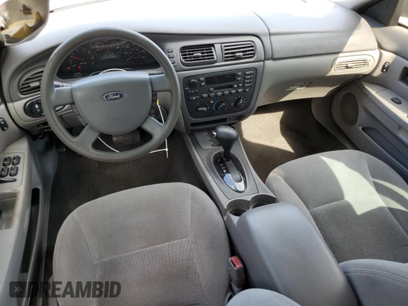 2004 Ford Taurus SE with VIN 1FAFP53U24A137741, listed as a Copart auction lot 54313915 with 92,739 mi miles and Salvage Title. Bid and sale history available at DreamBid. Image 8.