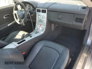 2004 Chrysler Crossfire z VIN 1C3AN69L34X004096, wystawiony jako Copart lot #73225274 z przebiegiem 48 598 mil mil oraz Szkoda całkowita • Salvage title. Historia ofert i sprzedaży dostępna na DreamBid. Obrazek 8.