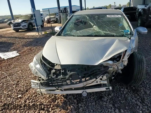 2019 Toyota Prius LE z VIN JTDL9RFU8K3000878, wystawiony jako Copart lot #49910575 z przebiegiem 169 918 mil mil oraz Szkoda całkowita • Salvage title. Historia ofert i sprzedaży dostępna na DreamBid. Obrazek 11.