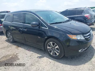 2015 Honda Odyssey Touring Elite with VIN 5FNRL5H90FB003506, listed as a IAAI auction lot 42585049 with 120,543 mi miles and . Bid and sale history available at DreamBid. Image 1.