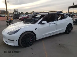 2022 Tesla Model 3 Performance with VIN 5YJ3E1EC3NF265334, listed as a Copart auction lot 84853734 with Not Provided miles and Salvage Title. Bid and sale history available at carsss.com. Image 1.