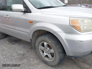 2006 Honda Pilot EX-L with RES with VIN 2HKYF18606H502115, listed as a IAAI auction lot 41872434 with 286,953 mi miles. Bid and sale history available at carsss.com. Image 6.