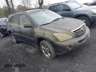 2006 Lexus RX 400h z VIN JTJHW31U662006058, wystawiony jako IAAI lot #41854087 z przebiegiem 233 043 mil mil oraz . Historia ofert i sprzedaży dostępna na DreamBid. Obrazek 1.