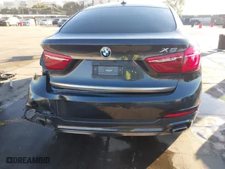 2019 BMW X6 sDrive35i with VIN 5UXKU0C57K0S97581, listed as a IAAI auction lot 41322568 with 76,635 mi miles. Bid and sale history available at carsss.com. Image 16.