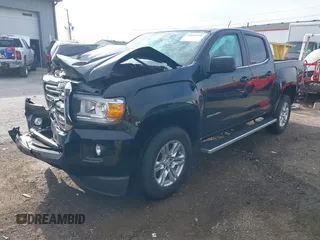 2019 GMC Canyon 4WD SLE z VIN 1GTG6CEN2K1354585, wystawiony jako IAAI lot #42014158 z przebiegiem 34 269 mil mil oraz . Historia ofert i sprzedaży dostępna na DreamBid. Obrazek 17.