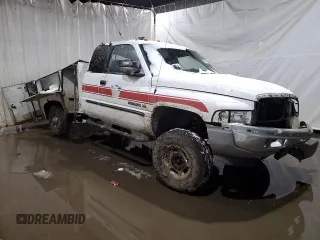 2001 Dodge Ram 2500 with VIN 1B7KF23Z11J571893, listed as a Copart auction lot 41463605 with 87,205 mi miles and Salvage Title. Bid and sale history available at carsss.com. Image 4.