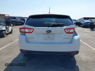 2018 Subaru Impreza with VIN 4S3GTAA64J3717886, listed as a IAAI auction lot 42572412 with 91,911 mi miles and . Bid and sale history available at DreamBid. Image 16.
