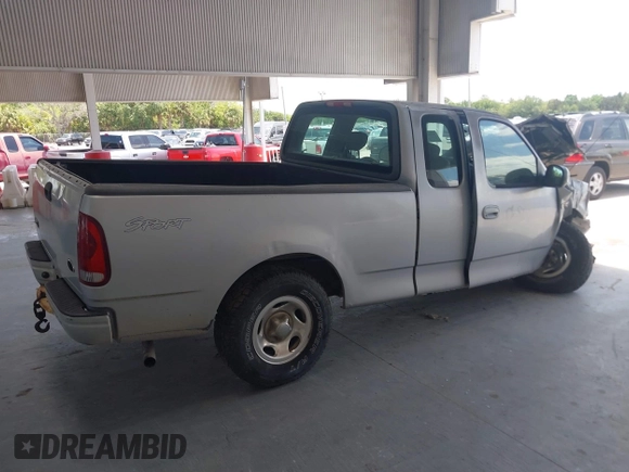 2003 Ford F-150 XL with VIN 1FTRX17213NB36760, listed as a IAAI auction lot 42170424 with 130,768 mi miles and . Bid and sale history available at DreamBid. Image 13.
