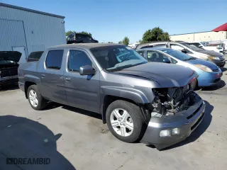 2011 Honda Ridgeline RTL with VIN 5FPYK1F58BB452957, listed as a Copart auction lot 63214204 with 223,311 mi miles and Salvage Title. Bid and sale history available at carsss.com. Image 4.