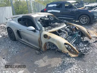 2017 Porsche 718 Cayman z VIN WP0AA2A89HS270863, wystawiony jako IAAI lot #42039112 z przebiegiem Nie podano mil oraz . Historia ofert i sprzedaży dostępna na DreamBid. Obrazek 1.