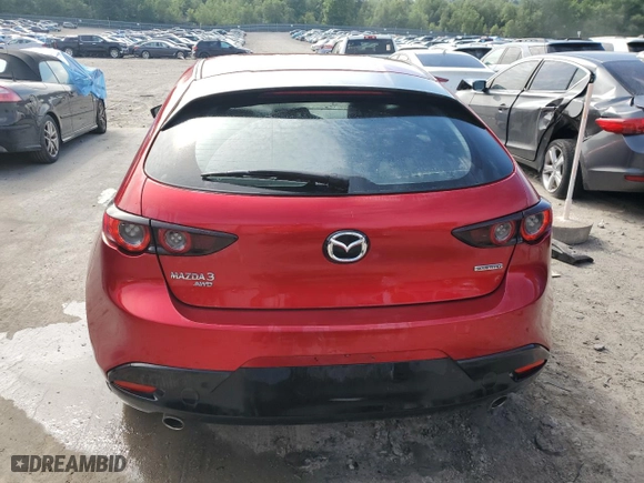 2019 Mazda Mazda3 Hatchback with VIN JM1BPBJM9K1140773, listed as a Copart auction lot 57002824 with 76,804 mi miles and Salvage Title. Bid and sale history available at carsss.com. Image 6.